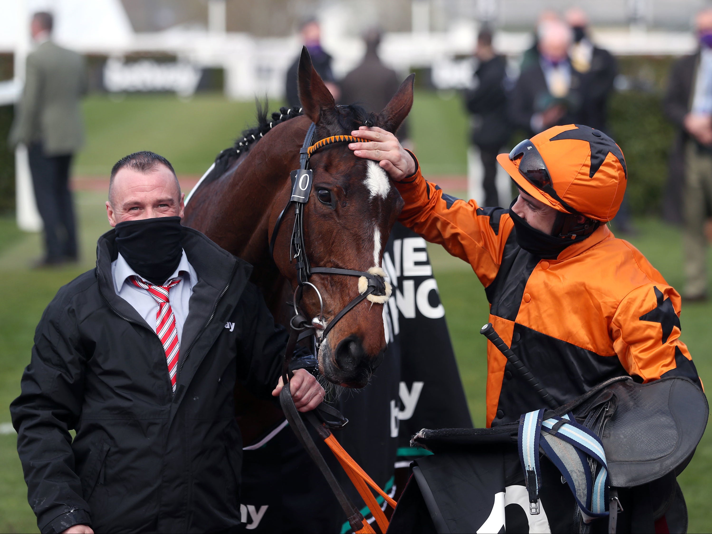 Aidan Coleman celebrates after winning the Champion Chase on Put The Kettle On