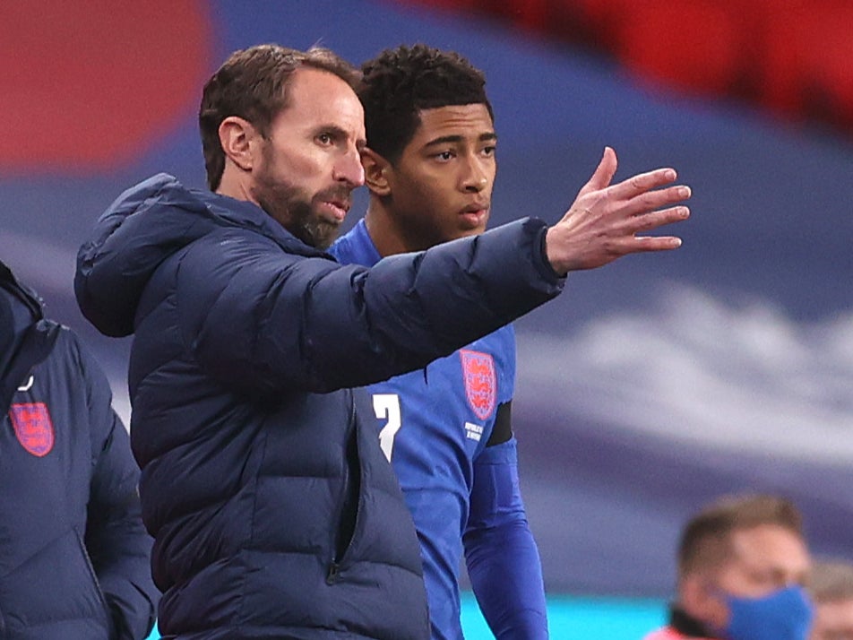 England youngster Jude Bellingham with coach Gareth Southgate