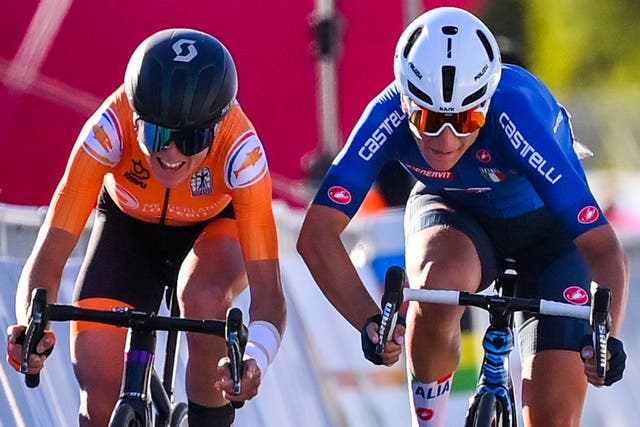<p>Annemiek van Vleuten and Elisa Longo Borghini sprint to cross the finish line at the Women’s Elite Road Race</p>
