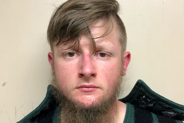 Robert Aaron Long, 21, of Woodstock in Cherokee County poses in a jail booking photograph after he was taken into custody by the Crisp County Sheriff’s Office in Cordele, Georgia, US 16 March, 2021