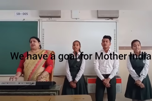 Screengrab from a video showing students singing “You Can Achieve” 