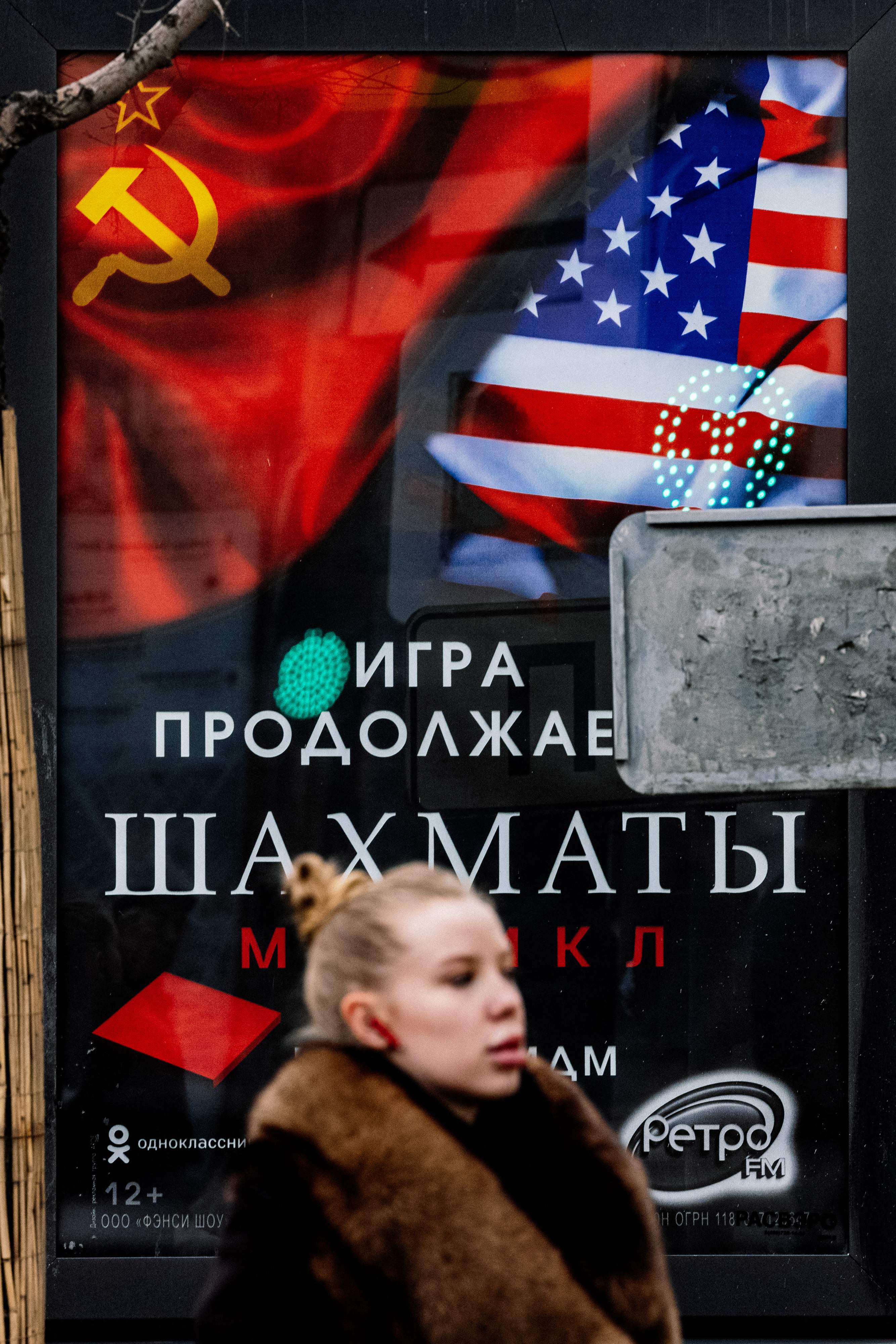 Diplomatic games: a poster with images of a Soviet and a US flags advertises legendary musical ‘Chess’ in Moscow on Thursday