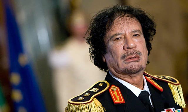 <p>The famously erratic Libyan leader Muammar Gaddafi was refusing to leave the country, with negotiations around whether he could remain in the country but leave politics</p>