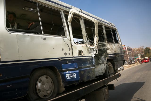 <p>A roadside bomb hit a bus on Thursday, killing four</p>