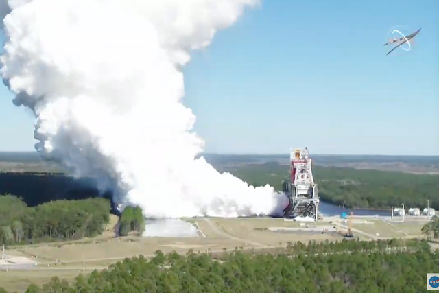 Nasa carries out a hot-fire test of the SLS rocket that will take the first women and the next man to the moon