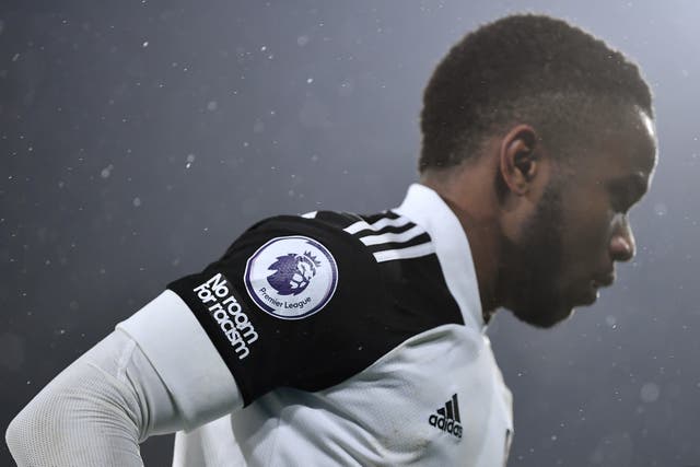 <p>A no room for racism logo is seen on the shirt of Ademola Lookman </p>