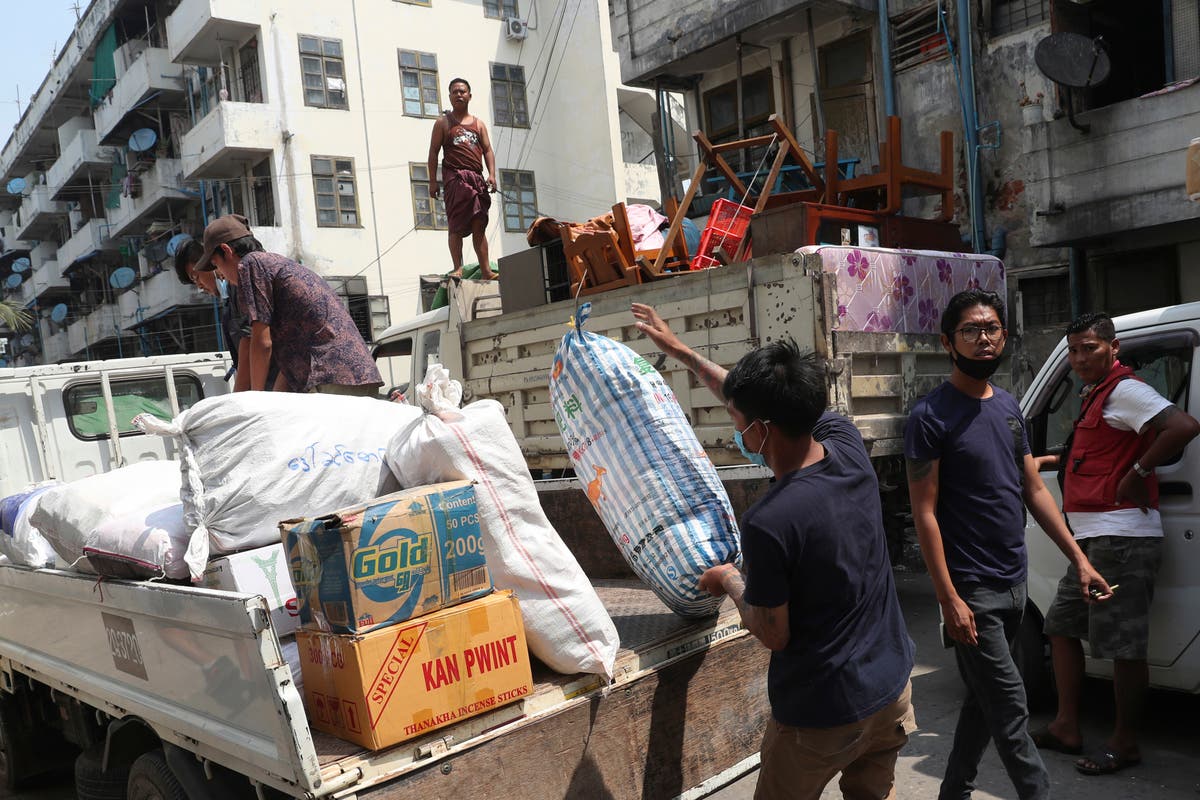 Striking Myanmar rail workers move out as protests continue