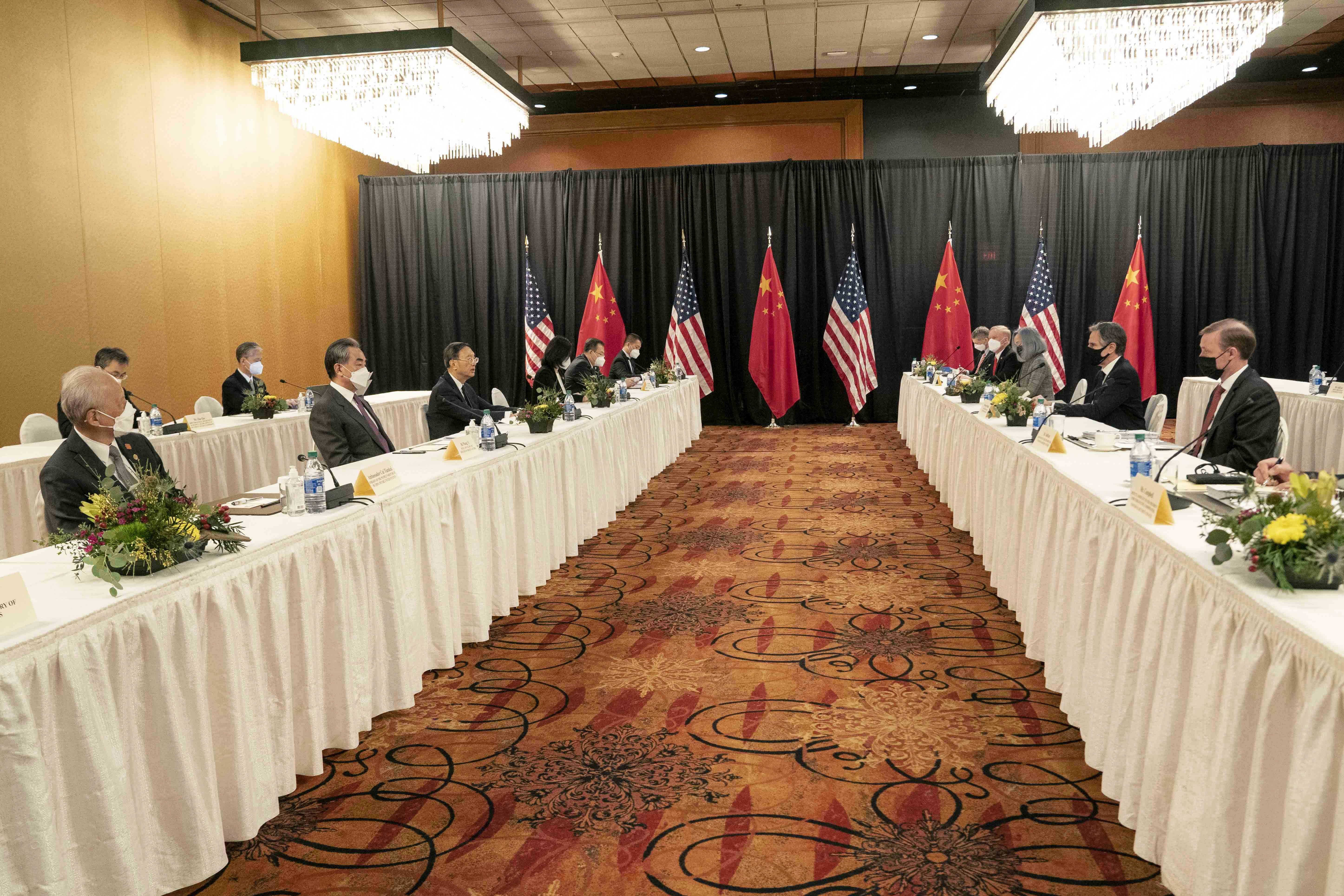Yang Jiechi (front row, third from left) and Antony Blinken (second from right) trade insults during the high-level strategic meeting in Anchorage