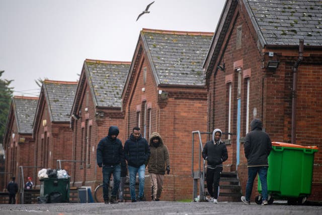 <p>Asylum seekers at Napier barracks in Kent</p>