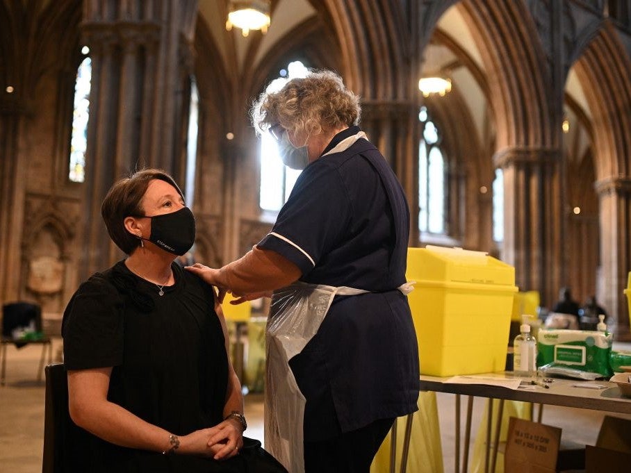 Members of the public receive a dose of the Oxford/AstraZeneca Covid-19 vaccine at Lichfield cathedral,