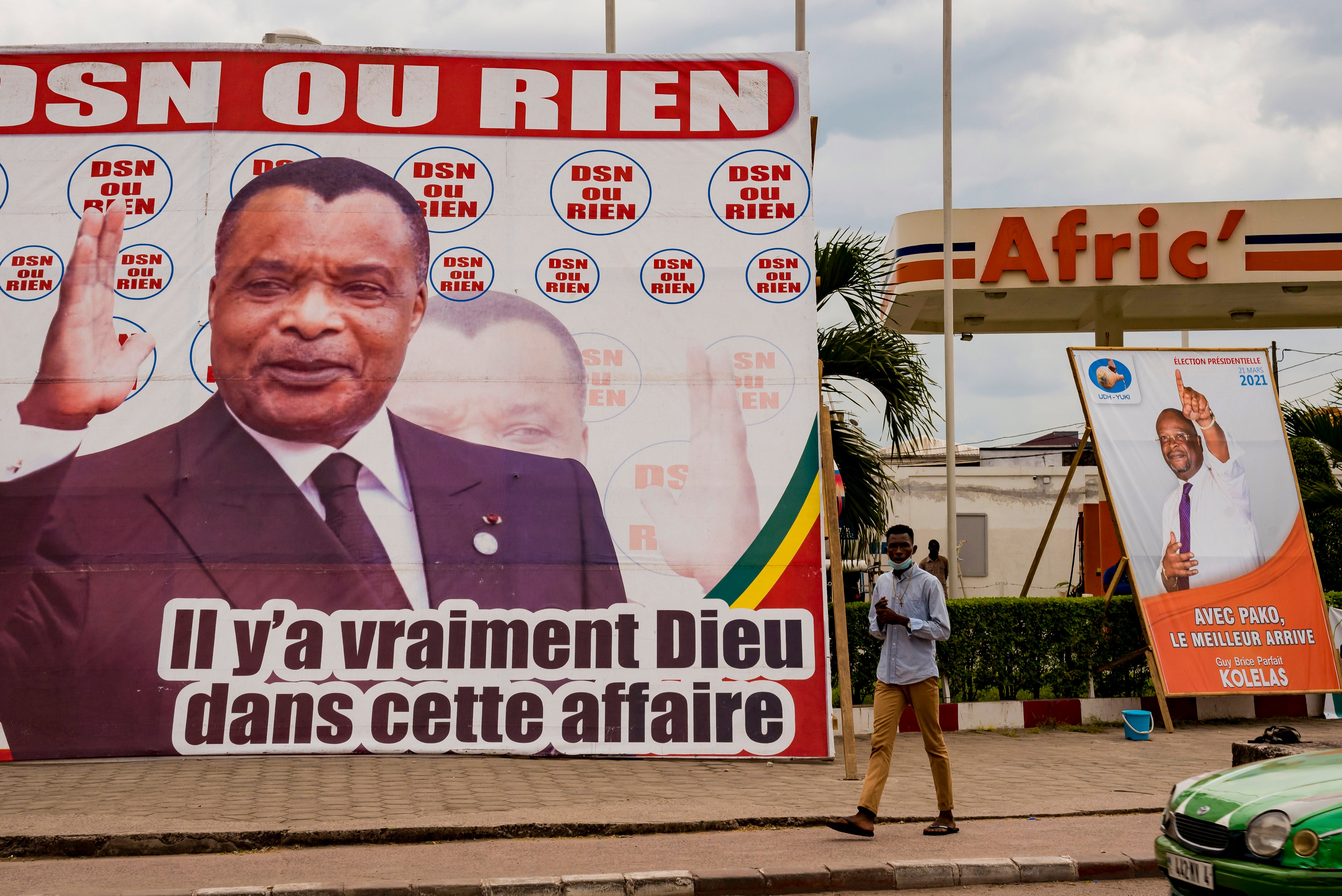 Election advertising for President Sassou Nguesso (left) and opposition candidate Guy Brice Parfair Kotelas (right)