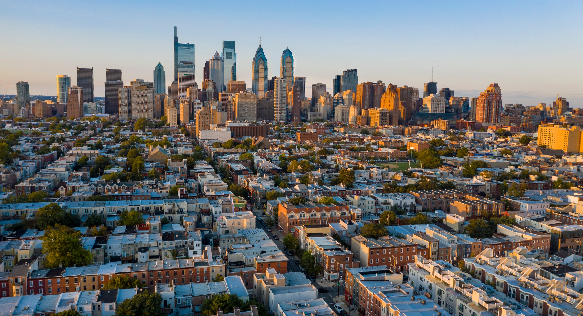 <p>Aerial view over the neighborhoods and streets of Philadelphia PA USA</p>