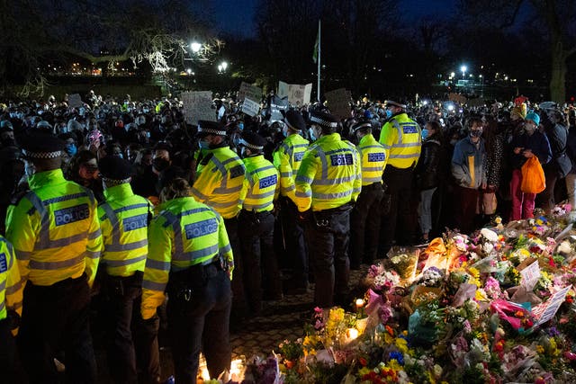 <p>People attend a vigil for Sarah Everard in Clapham this month</p>