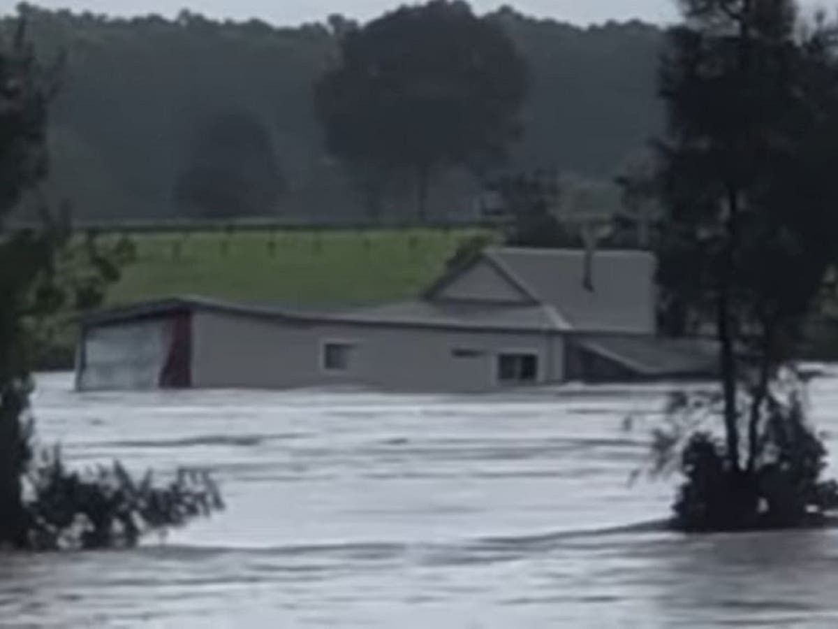 Australia floods: Couple&rsquo;s house swept away on wedding day