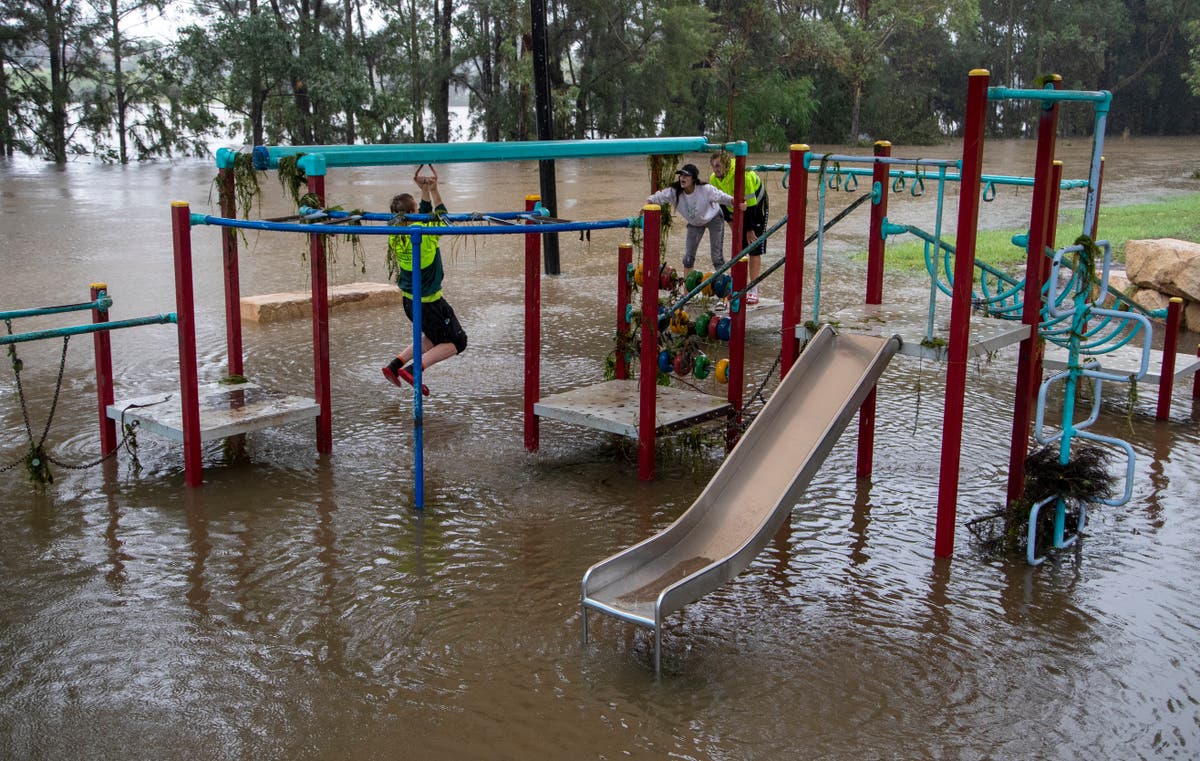 Dozens of towns isolated by flooding in Australian state