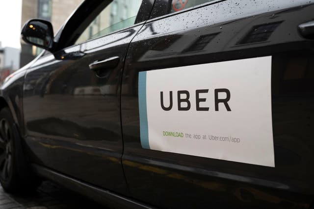 <p>A close-up of an Uber sticker on the side of a car on 19 February, 2021</p>