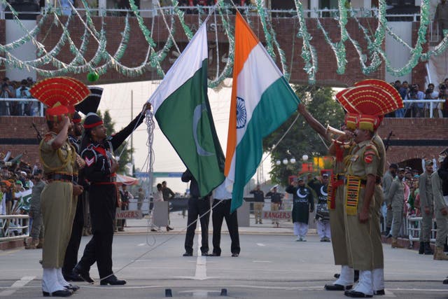 <p>File: Indian Border Security Force personnel and Pakistani Rangers perform flag ceremony at India-Pakistan Wagah border</p>