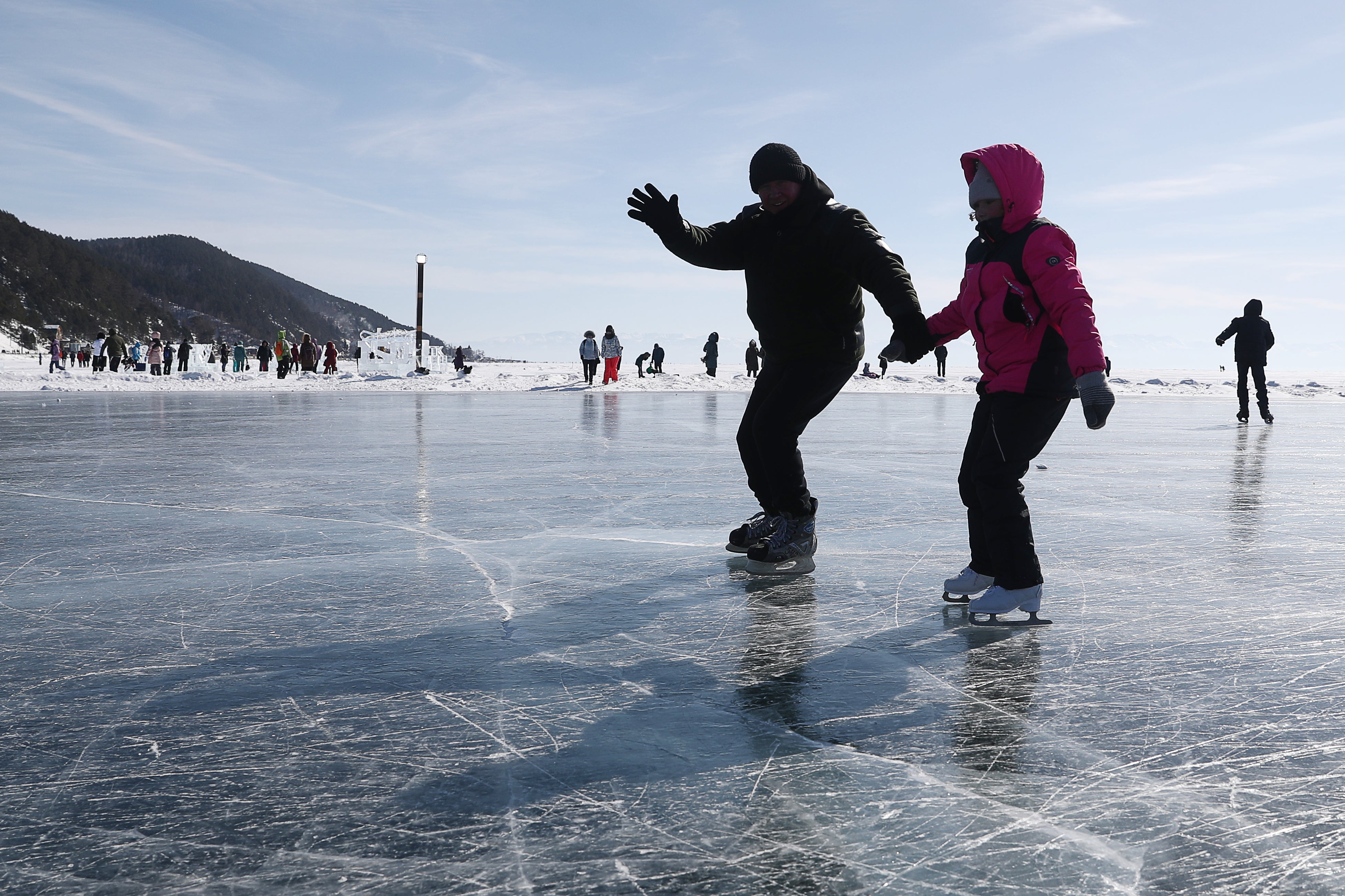 Tour guides are calling it Russian Season as usually, it is foreigners who flock to Lake Baikal this time of year to skate, bike, hike, run, hover and ski