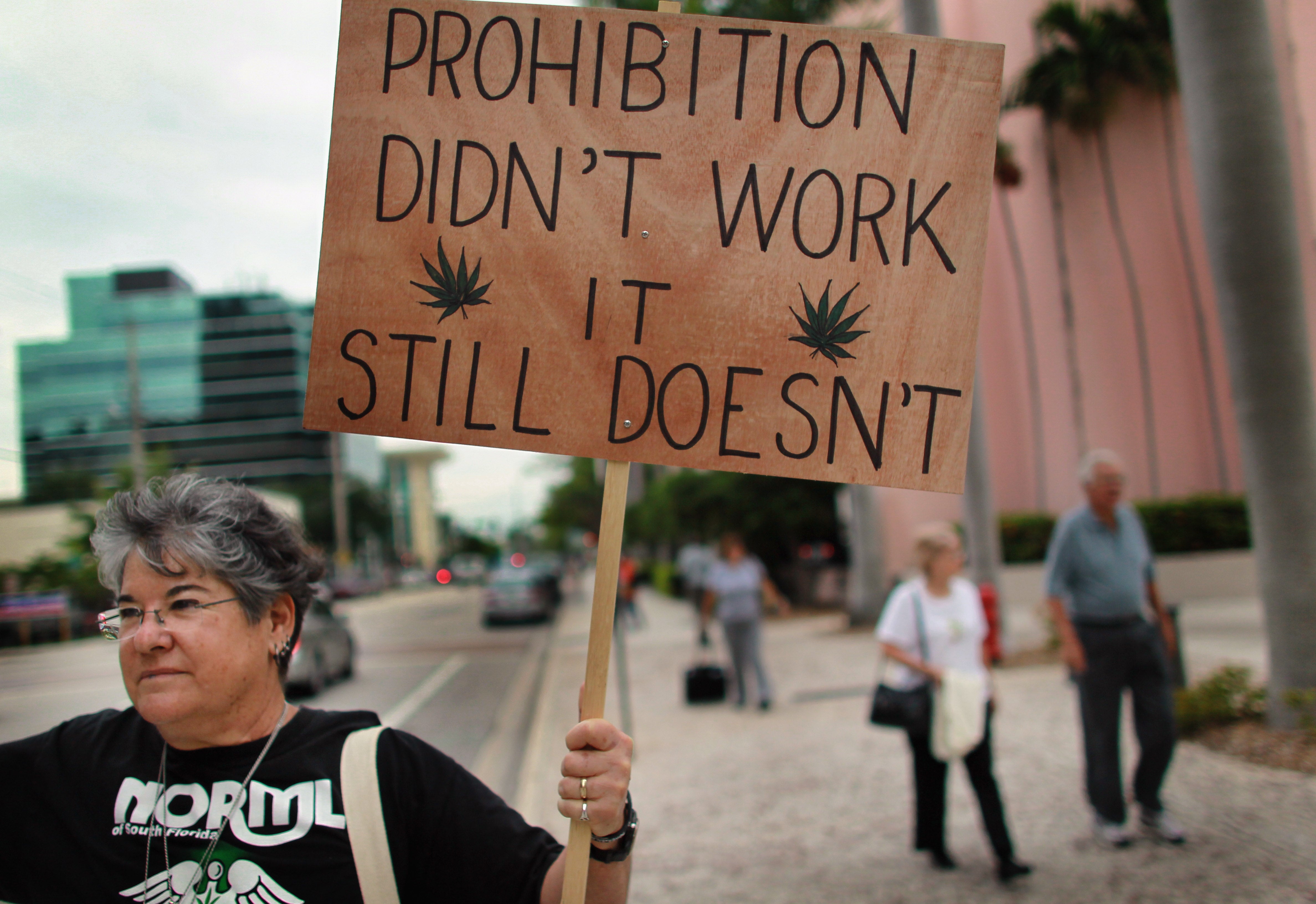 A woman attends a rally for the legalisation of marijuana in Florida in 2010