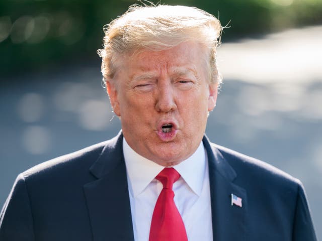 Donald J Trump speaks to the media as he departs the White House for Colorado in Washington, DC, on 30 May 2019