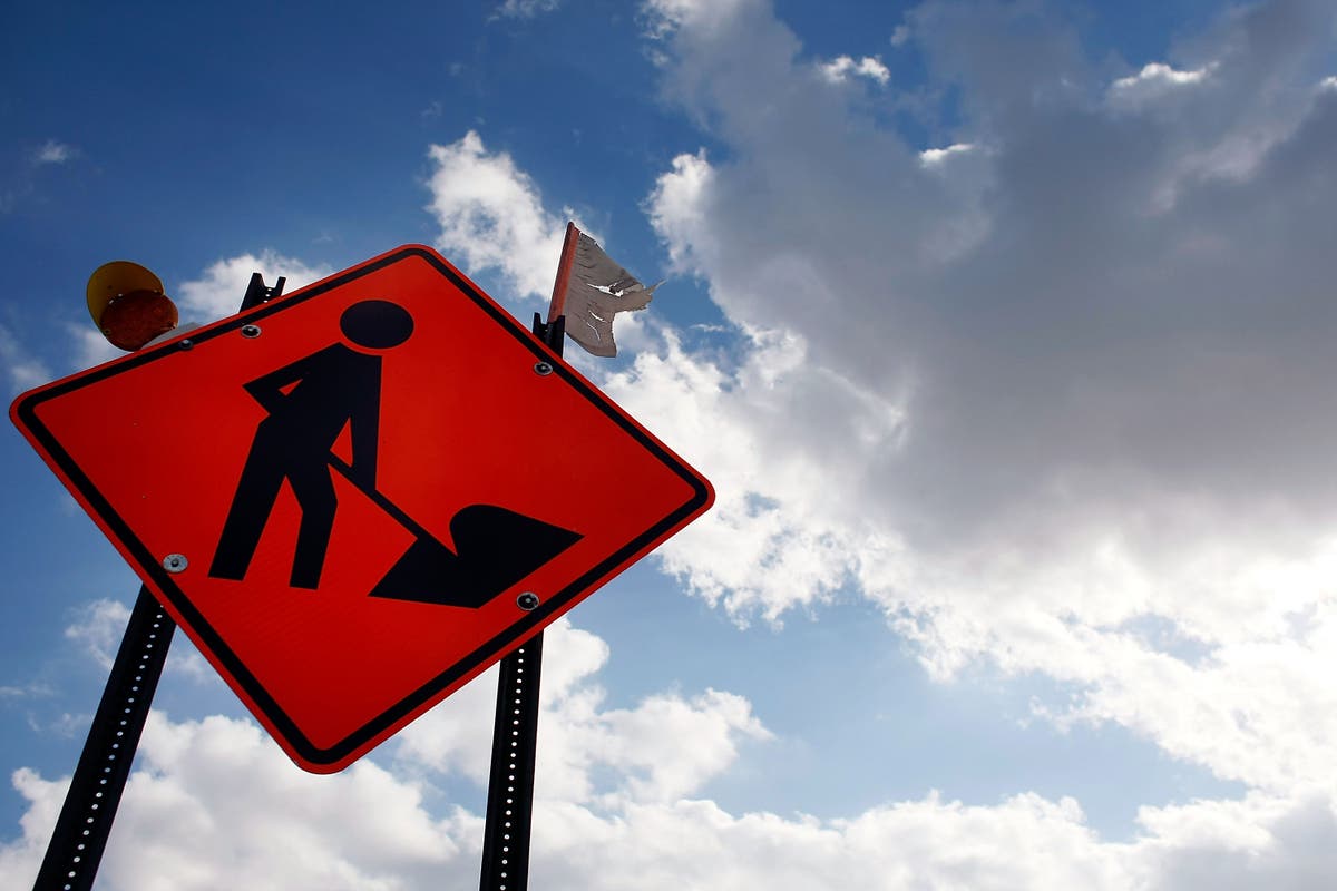 Woman throws &lsquo;birthday&rsquo; party for roadworks tearing up her street for a year