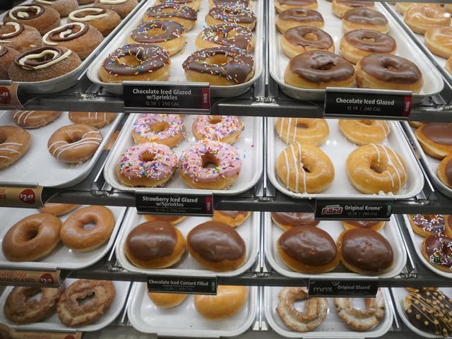 Donuts are on display inside the new Krispy Kreme flagship store amid the coronavirus pandemic in Times Square, New York, September 15, 2020. 