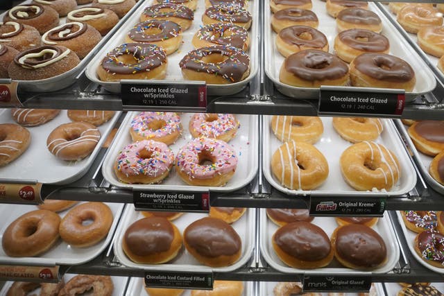 Donuts are on display inside the new Krispy Kreme flagship store amid the coronavirus pandemic in Times Square, New York, September 15, 2020. 