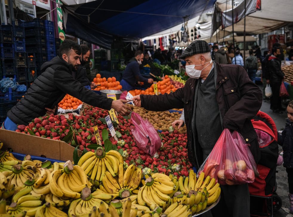 <p>A market in Istanbul on Monday after Turkey’s currency lost nearly 15 per cent. President Recep Tayyip Erdogan sacked its central bank governor at the weekend</p>