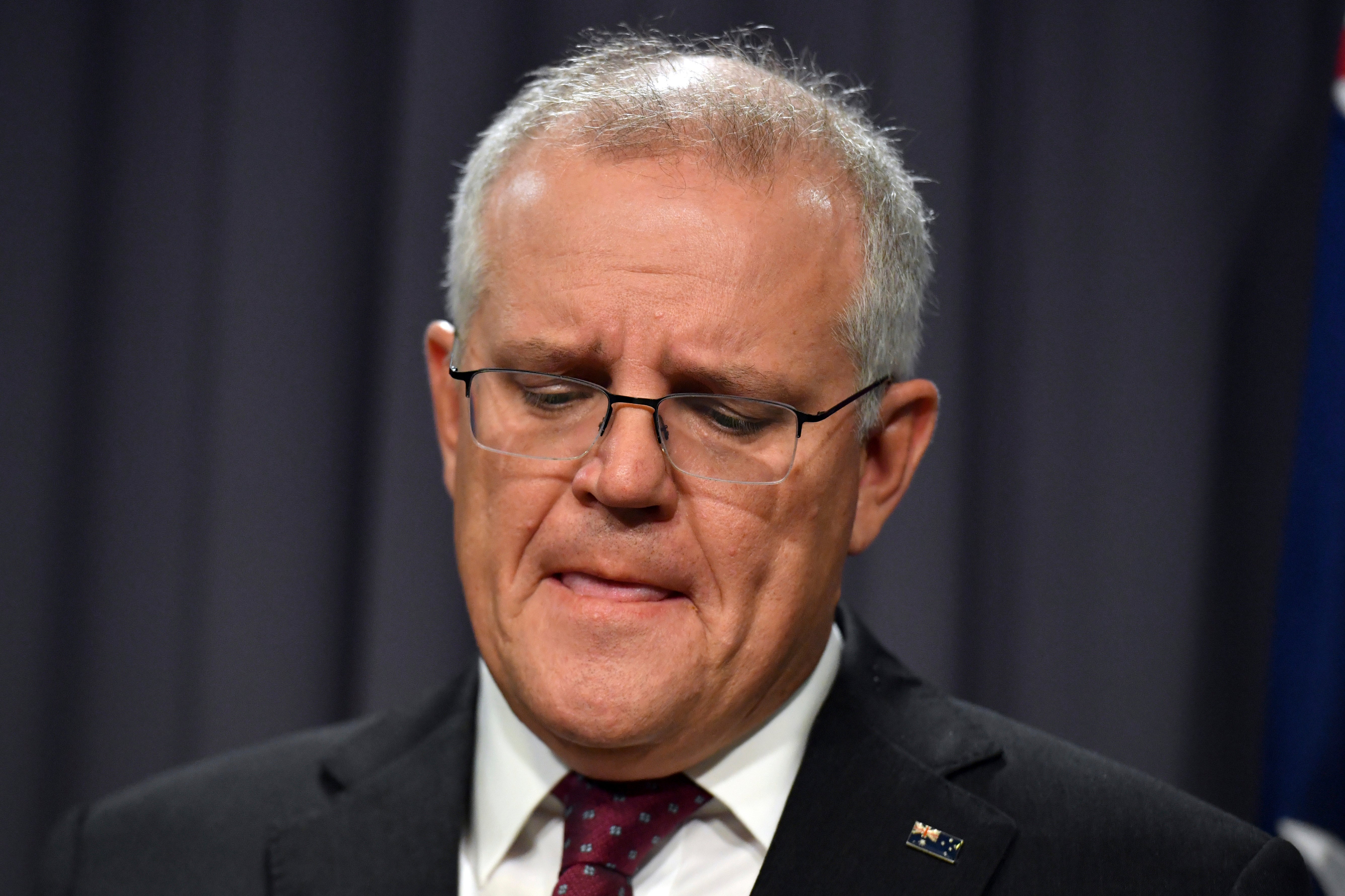 Australian Prime Minister Scott Morrison reacts to the videos surfaced of staffers performing ‘sickening’ act, while speaking during a press conference at Parliament House in Canberra