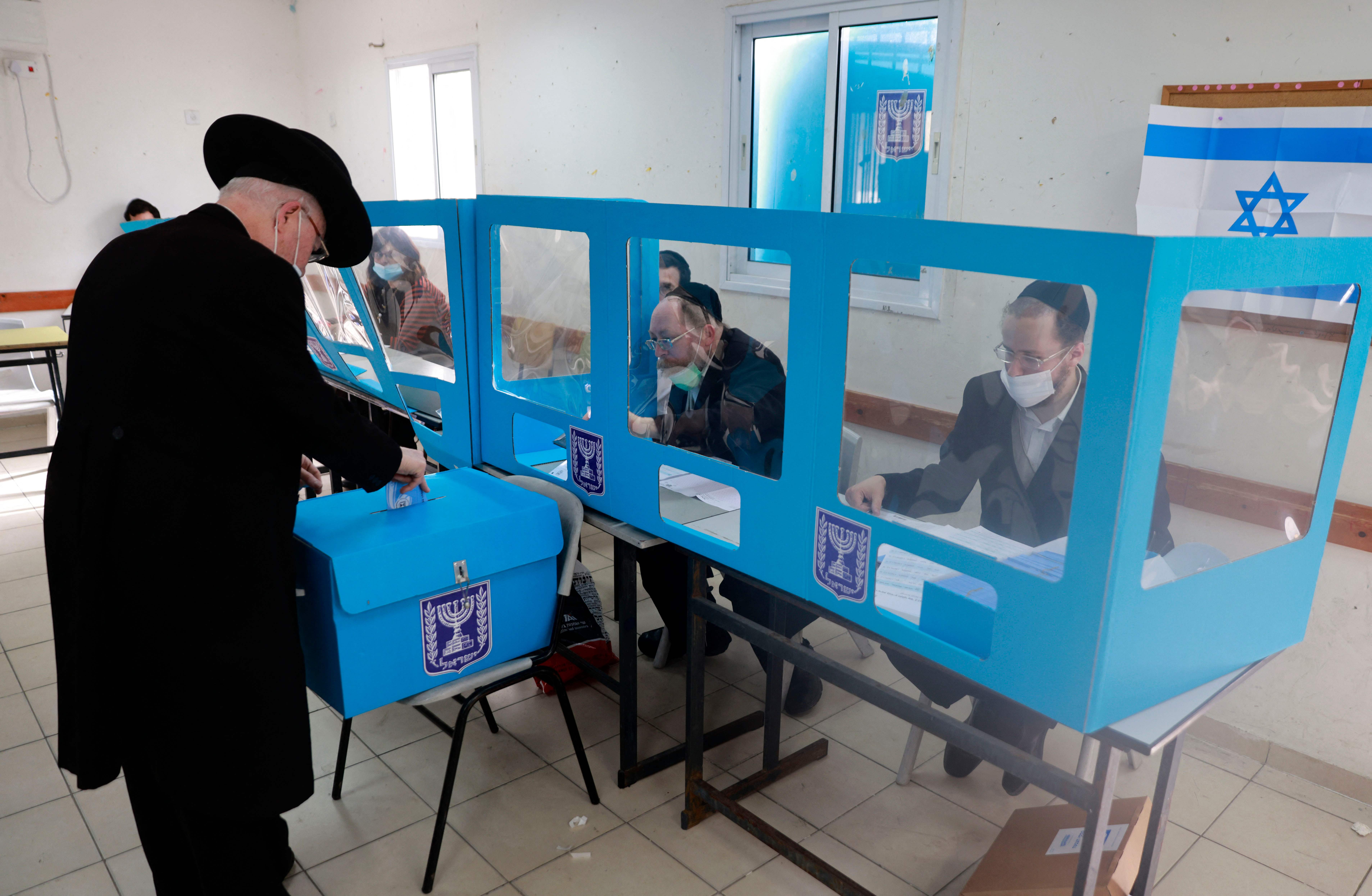 Israelis cast their ballots on Tuesday in Bnei Brak as part of the fourth national election in two years