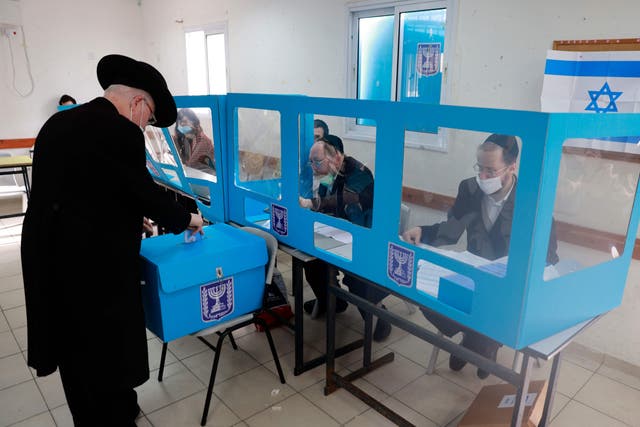 Israelis cast their ballots on Tuesday in Bnei Brak as part of the fourth national election in two years