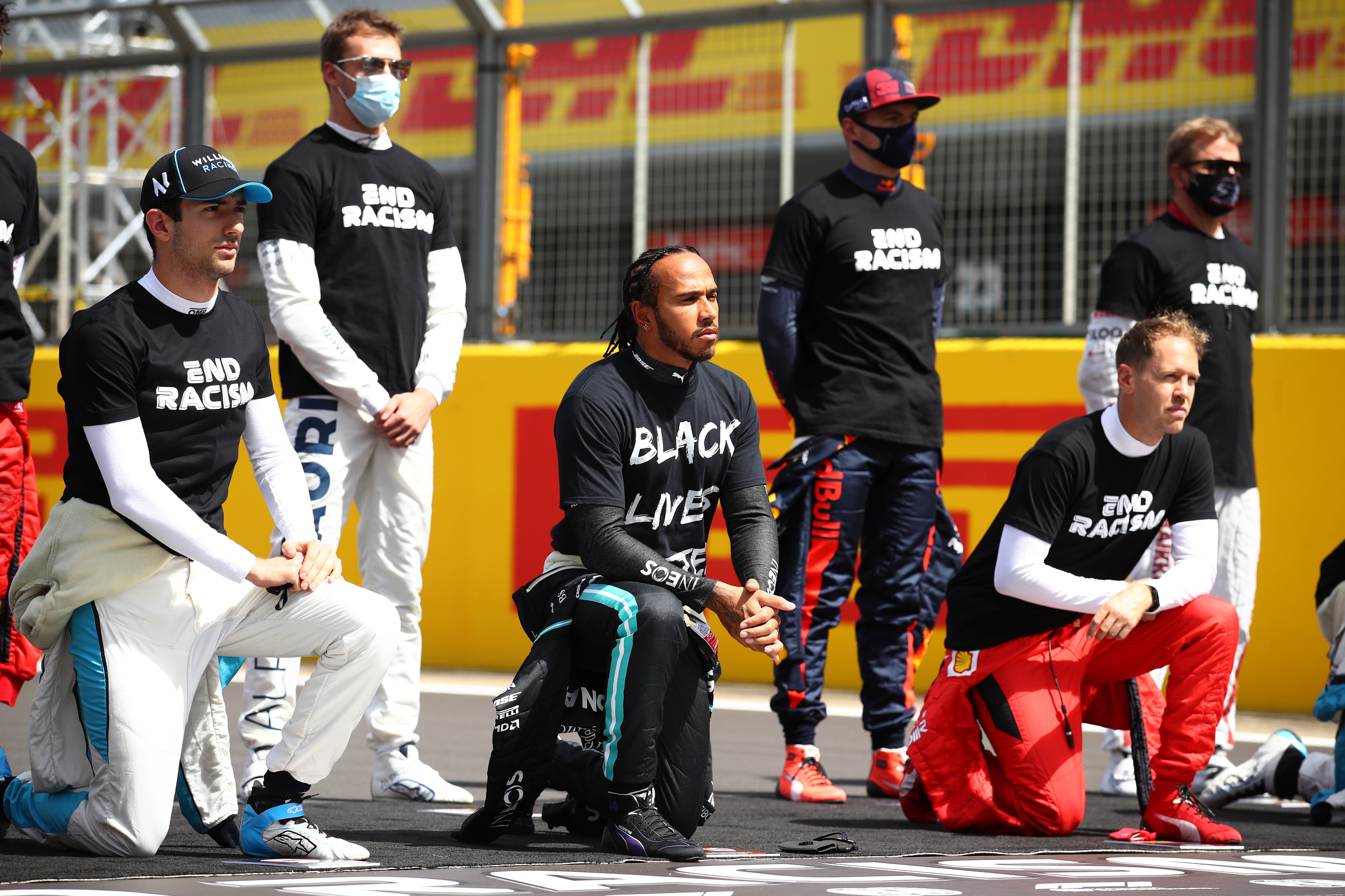 Drivers take a knee before the Grand Prix of Great Britain at Silverstone last year