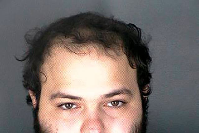 This undated photo provided by the Boulder Police Department shows Colorado shooting suspect Ahmad Al Aliwi Alissa