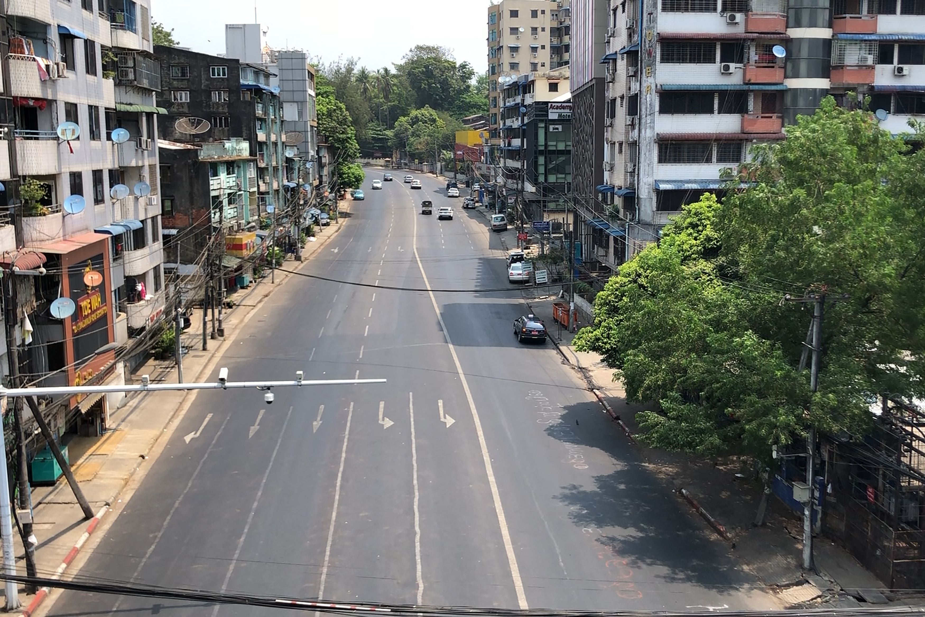 Screengrab provided via AFPTV shows an empty street in Yangon as demonstrators called for a “silent strike” on 24 March