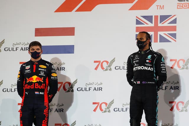 Max Verstappen (left) and F1 world champion Lewis Hamilton