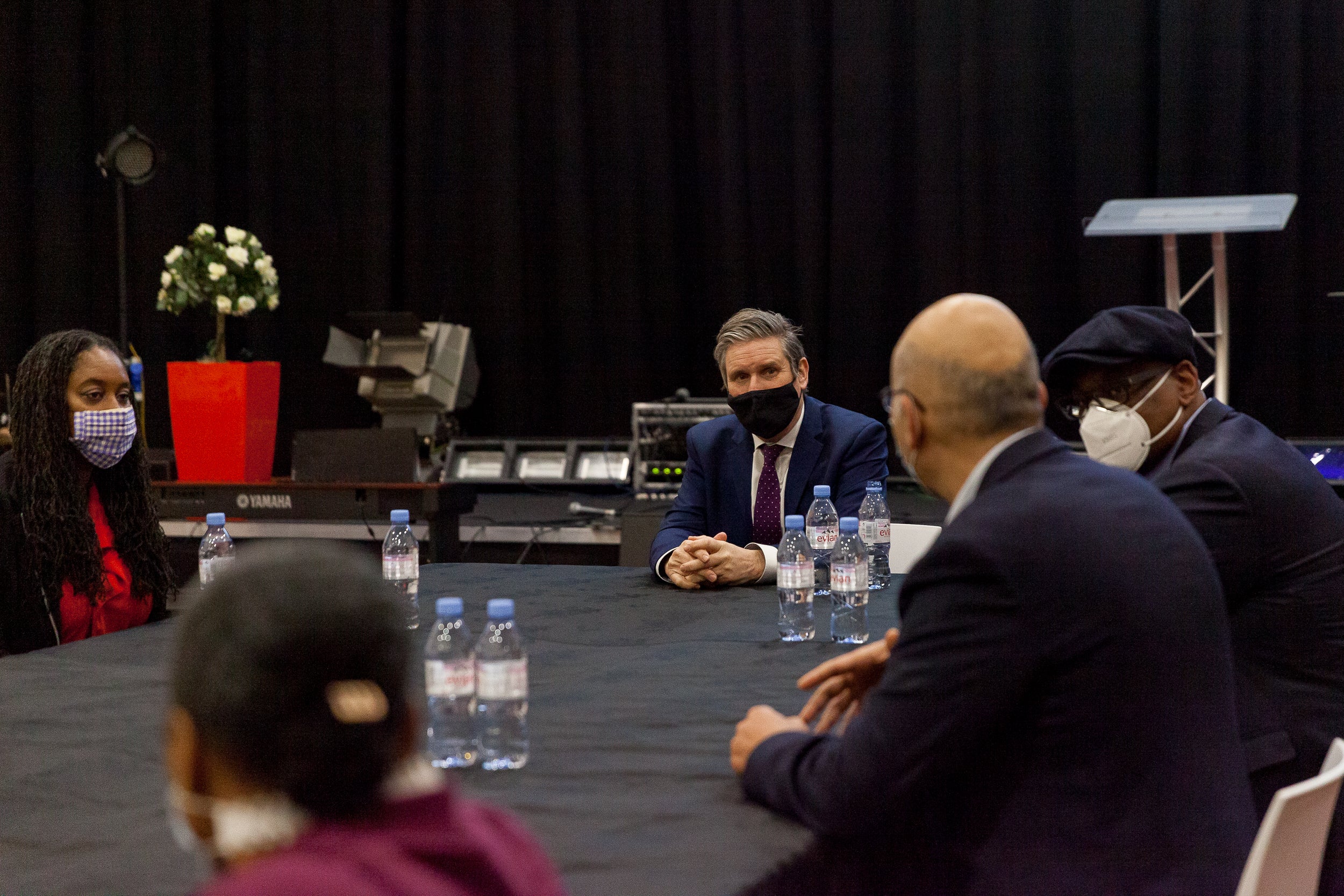 Keir Starmer and Dawn Butler speaking to faith leaders at a roundtable discussion