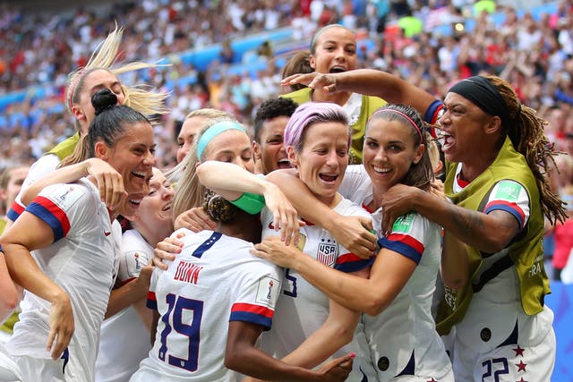 <p>Megan Rapinoe of the USA celebrates with teammates</p>