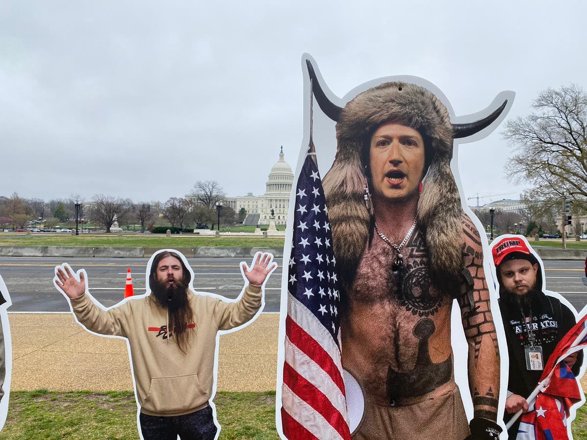 Facebook, Twitter, and Google CEOs depicted as cardboard-cutout insurrectionists in front of Capitol buildingF