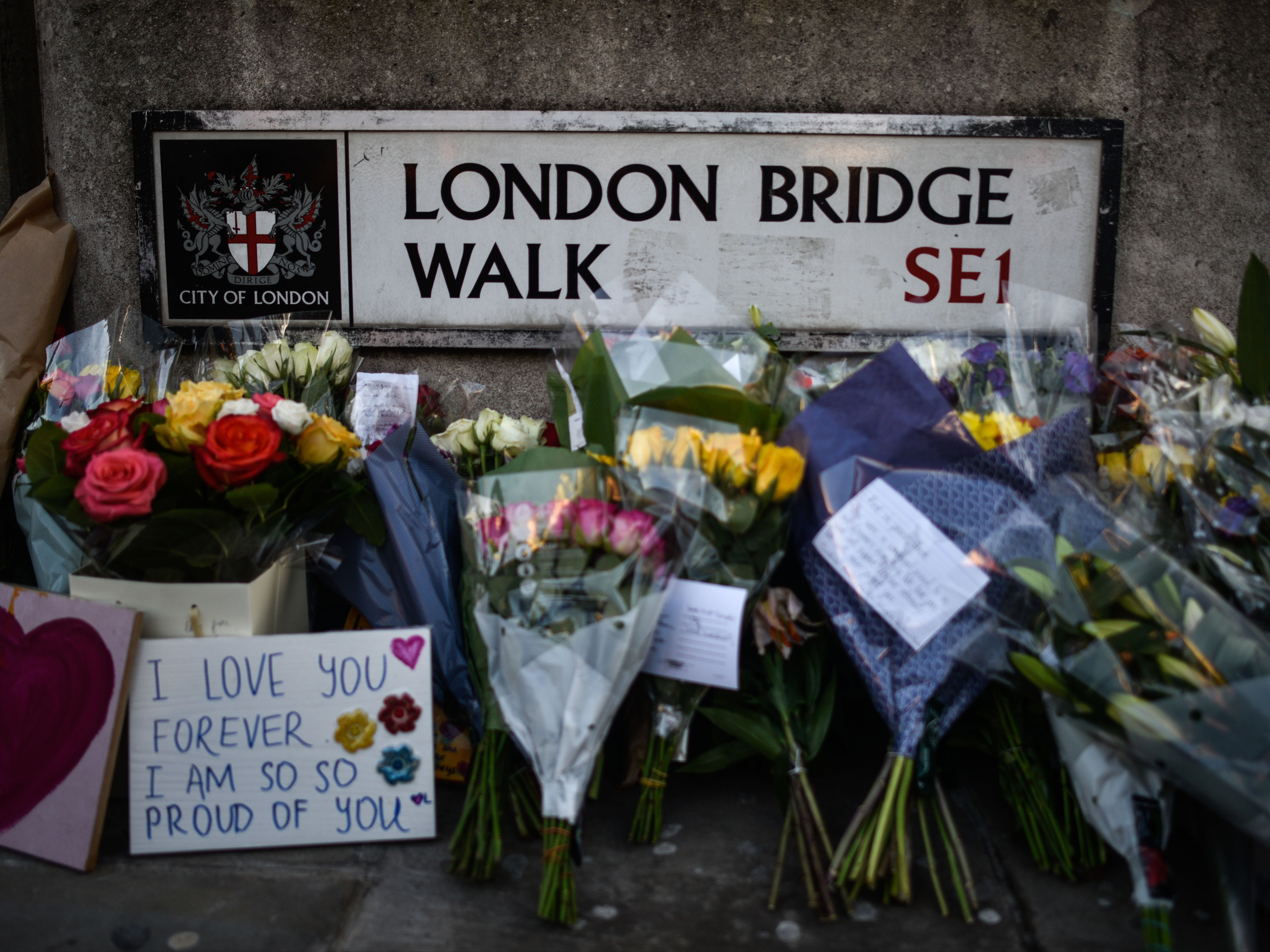 Floral tributes are left for Jack Merritt and Saskia Jones, who were killed in a terror attack on 29 November 2019