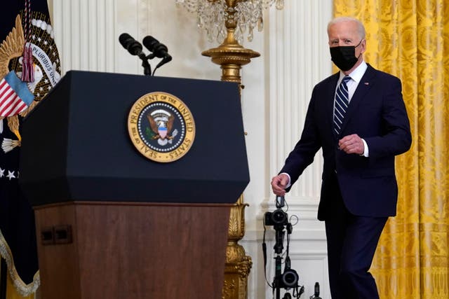 President Joe Biden arrives for his first news conference in the East Room of the White House, Thursday, March 25, 2021