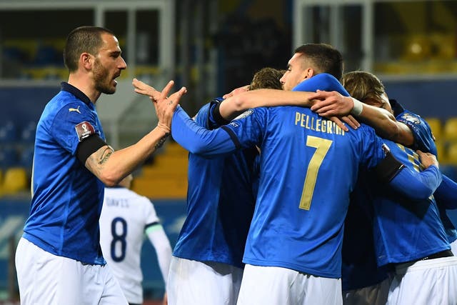 An in-form Italy sealed victory over Northern Ireland with two first-half goals