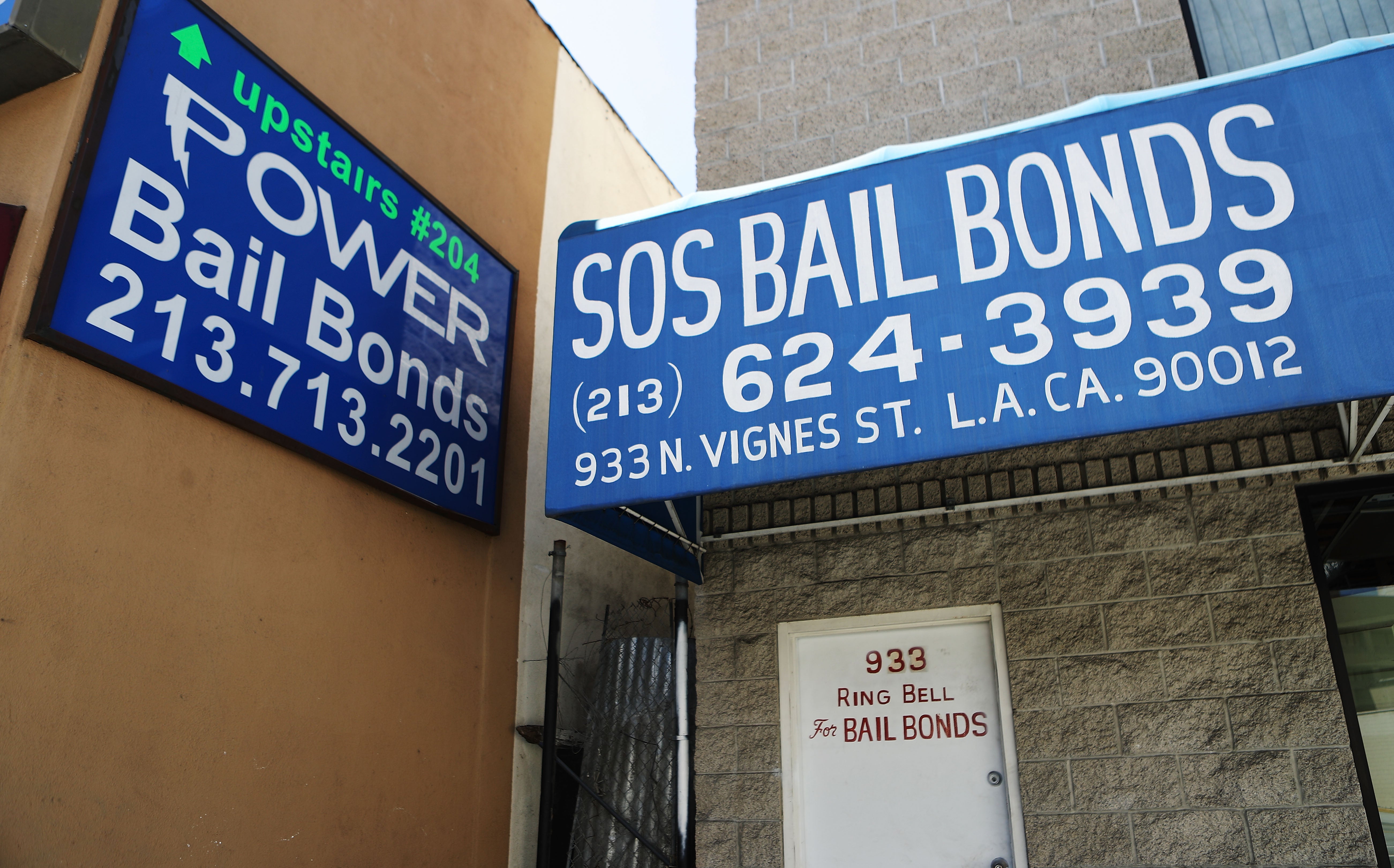 Signs advertise bail bond companies on August 29, 2018 in Los Angeles, California.