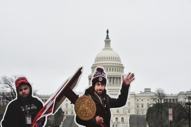 <p>An effigy of Twitter CEO, Jack Dorsey (C), dressed as a January 6, 2021, insurrectionist is placed near the US Capitol in Washington, DC, on March 25, 2021</p>