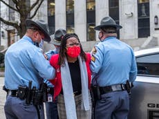 Fury as Georgia congresswoman arrested and hauled out of state capitol after knocking on governor’s door