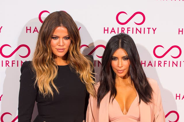 Khloe Kardashian (left) and Kim Kardashian West attending the Hairfinity UK Launch Party, at Il Bottaccio, in central London.