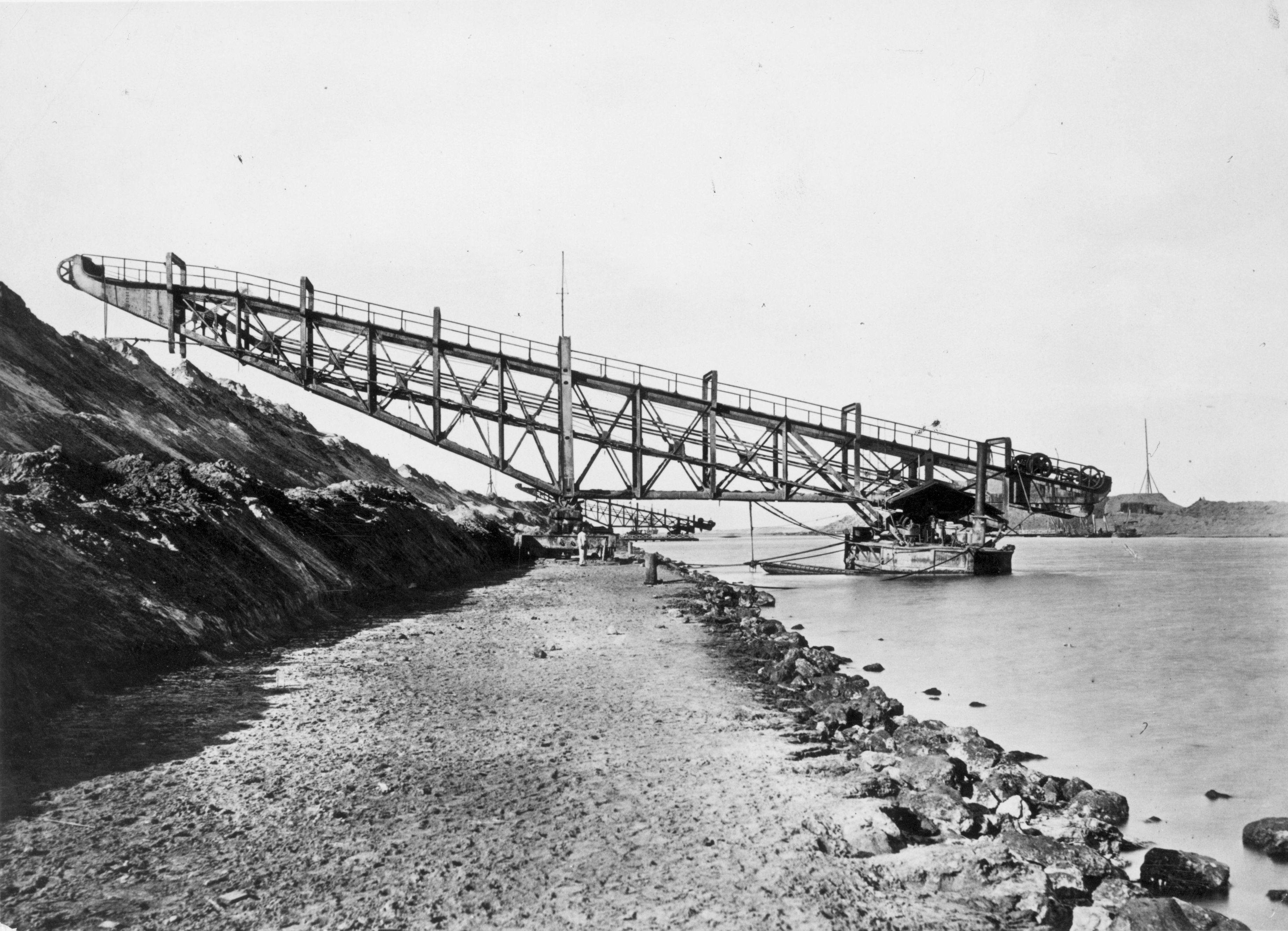 circa 1860:  A dredger and excavator in operation during the construction of the Suez Canal.