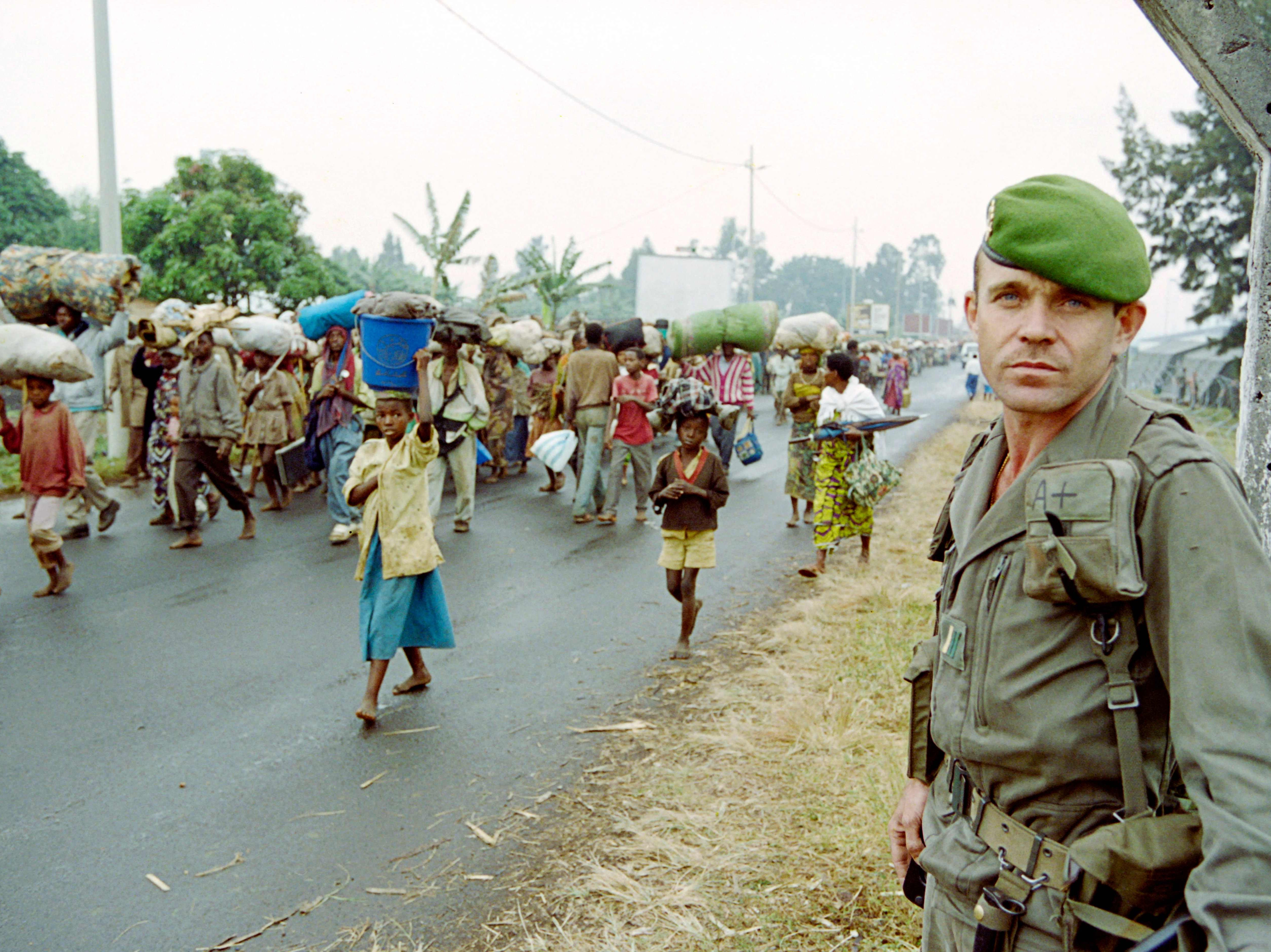 In this file photo taken on 12 July 1994, a French soldier mans his position near the village of Kivumu, in West Rwanda, as Rwandan refugee flee the fightings
