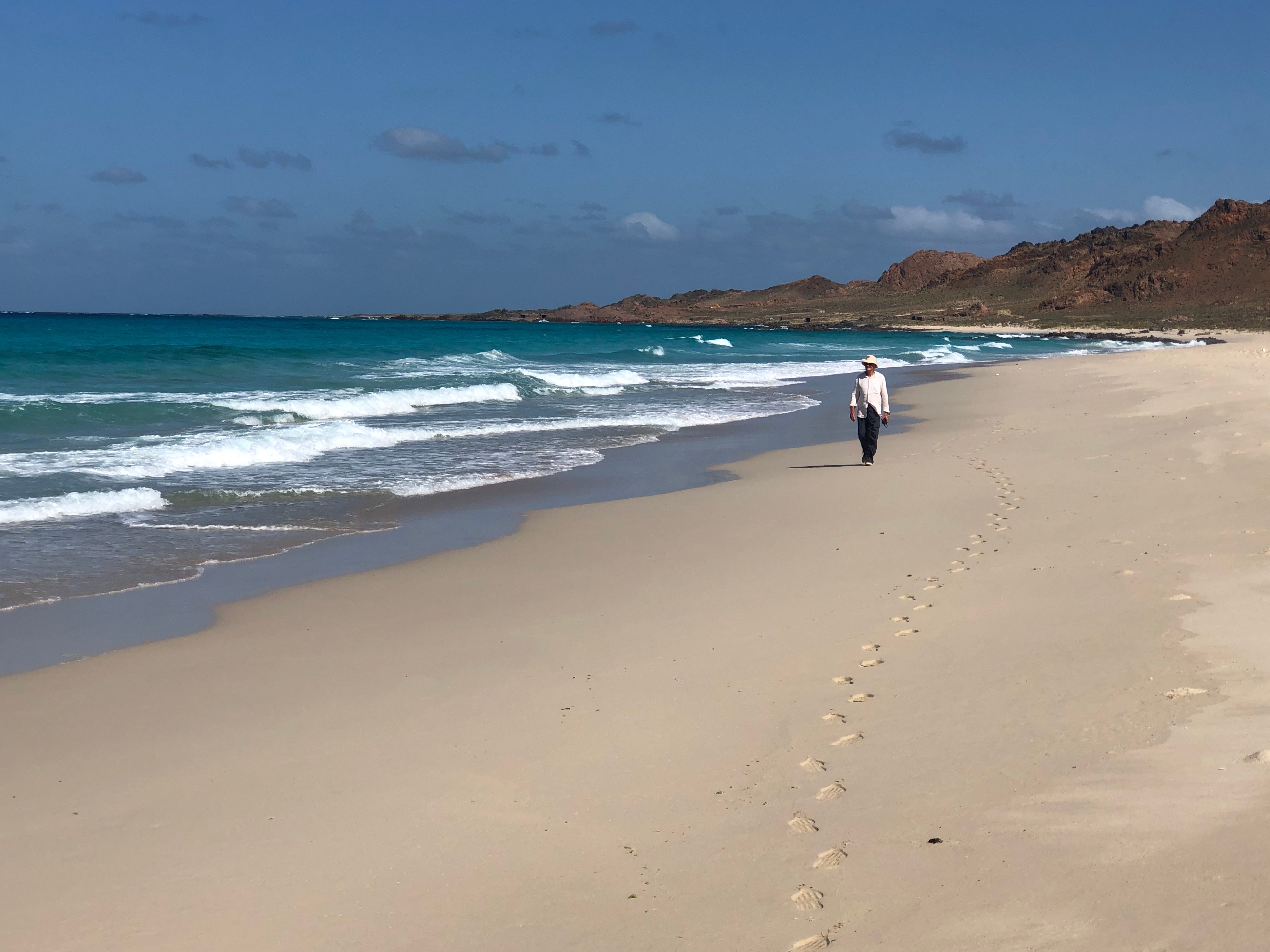 Lonely planet: Tony Wheeler, co-founder of the travel guide firm, on a beach on the Yemeni island of Socotra
