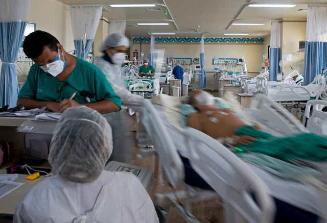 Medical workers and COVID-19 patients at the Dr. Abelardo Santos Regional Hospital in Belem, Para state, Brazil, on March 26, 2021