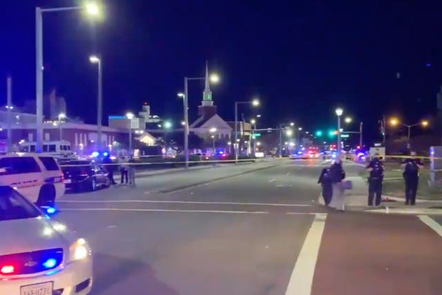 <p>A large police presence in Virginia Beach on Friday 26 March</p>
